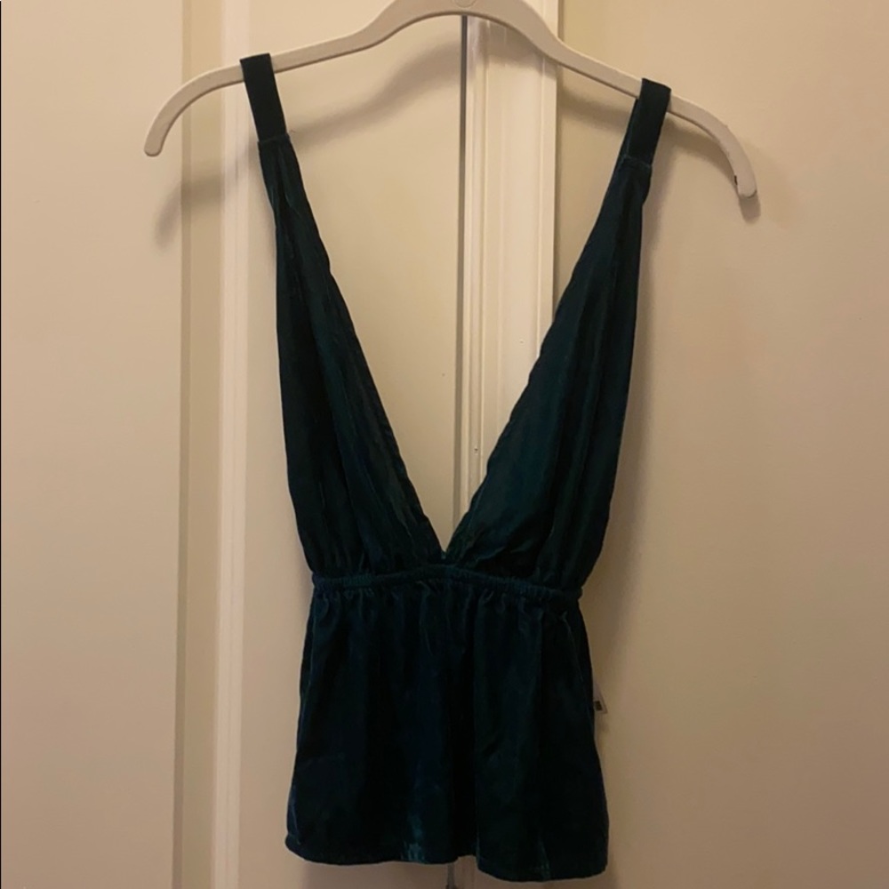 Never worn dark green velvet peplum top